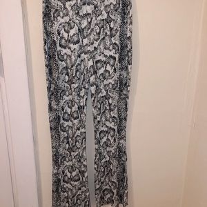 NEVER WORN Boot cut stretchy snake print pants